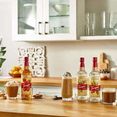 Torani syrup pouring into cup, demonstrates smooth texture and easy mixing