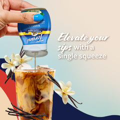 Torani sugar free vanilla bottle next to a credit card to show compact travel size