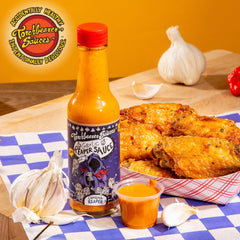 Torchbearer Sauces Garlic Reaper sauce texture on spoon showing creamy consistency
