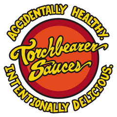 Torchbearer Sauces Mushroom Mayhem poured onto tacos to enhance savory flavor and medium heat