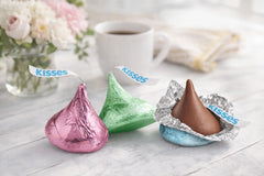 TREATBASKET close-up of red green silver blue foil wrappers showing vibrant seasonal presentation