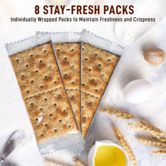 Tribello Paskesz whole wheat cracker next to hand showing portion size