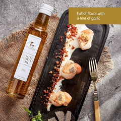 TruffleHunter oil being poured as finishing oil to enhance dish aroma and flavor