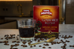 jar of Trung Nguyen coffee with scoop showing 17.6oz scale and portion convenience