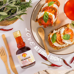 TUTTOCALABRIA pouring action into dish, adds controlled spicy flavor and richness