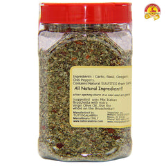 TUTTOCALABRIA seasoning sprinkled over spaghetti bowl adding authentic Calabrian heat and color