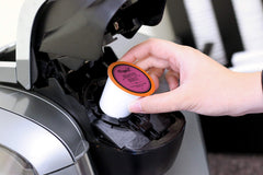 Two Rivers Coffee close-up of single herbal K-Cup pod for freshness and convenience