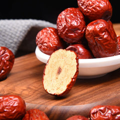 ULTHMOK dates in a ceramic bowl as a ready-to-eat snack option