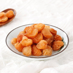 ULTHMOK dried longan in a serving bowl, ready-to-eat convenient snack