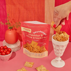 Unbothered Foods crackers paired with goat cheese for tasty pairing
