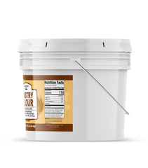 Scoop of Unpretentious pastry flour texture showing fine mill for tender results