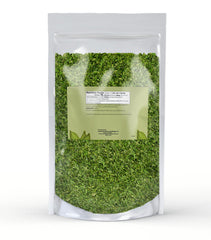 Unpretentious close-up of dried spinach flakes texture for easy measuring