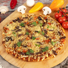 UPrise NOOCH IT sprinkled on pasta for cheesy flavor without dairy