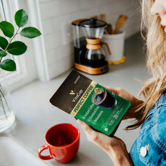 scoop of VitaCup beside measuring scale showing precise 20-serving pouch