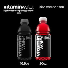 vitaminwater XXX bottle held in hand illustrating portability and on-the-go refreshment