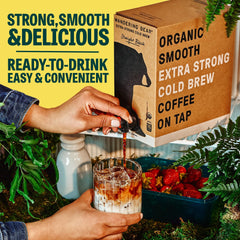Wandering Bear box being used to refill a pitcher for multiple servings