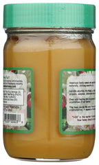 Wee Bee Honey close-up spoon showing raw texture and viscous richness