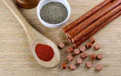 Wenzel's Farm close-up texture of snack stick revealing real meat and spice