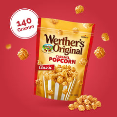 Open 140g bag in hand pouring popcorn, showing Werther's Original convenience for on-the-go snacking