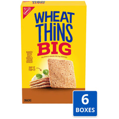 Wheat Thins stacked crackers showing size comparison and topping support
