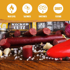 Wicked Cutz teriyaki stick in a hand showing portion size and portability