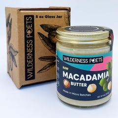 Wilderness Poets top view of open jar revealing creamy macadamia butter texture and freshness