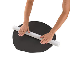 Wilton black fondant draped over 8-inch cake demonstrating seamless, professional coverage