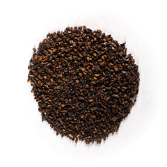 Worldwide Botanicals brewed chicory cup in kitchen setting showing comforting caffeine-free benefit