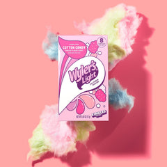 Wyler's Light powder texture in spoon emphasizing easy dissolving and flavorful benefit
