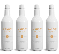 XANGO mangosteen juice poured into a glass on a table, showing serving suggestion and refreshing appeal