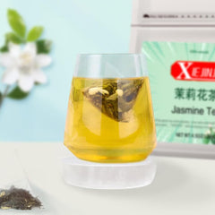 XIEJINJI close-up of whole green tea leaves and jasmine blossoms for aroma