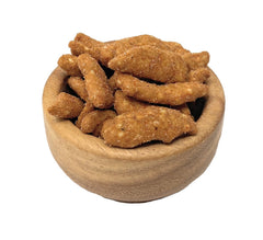 YANKEETRADERS sesame sticks in bowl at party conveying shareable crunch and bold flavor