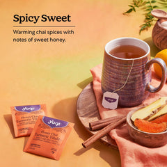 Yogi steaming cup of tea in hand offering comforting, cozy benefit