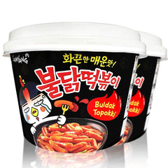 Yopokki front packaging showing two spicy tteokbokki pouches and branding benefits