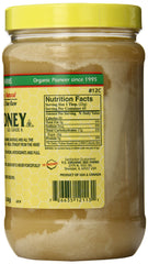 Y.S. Eco Bee Farms jar open with honey pour illustrating texture and natural flavor