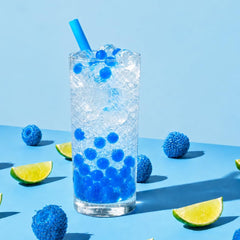 YULU FOODS Blue Razz close-up of pearl membrane showcasing texture and burst-ready center for sensory detail