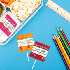 YumEarth assorted flavors laid out to show variety and kid-friendly appeal