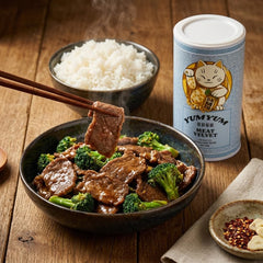 Cooked stir-fry with YUMYUM-treated meat showing juicy, tender bite and appealing colour