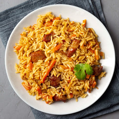 bowl of cooked Yupik brown jasmine rice showing tender fluffy grains