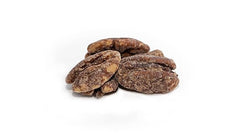Yupik pecans on serving platter in lifestyle scene showing gifting appeal