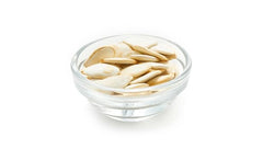 Yupik pumpkin seeds in serving bowl showing ready-to-eat snack benefit