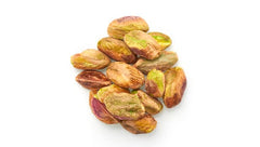 Yupik close-up of raw pistachio kernels highlighting crunchy texture and natural color