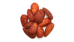 Yupik close-up of tamari glaze on almonds showing crunchy texture and savory appeal