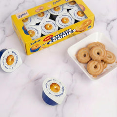 Zyluc open single cup revealing three crisp cookies for mess-free snacking