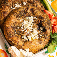 Z&Z zaatar sprinkled on flatbread highlighting savory finish