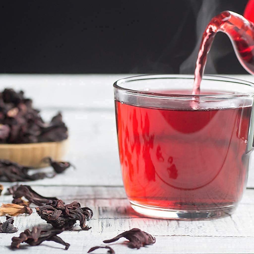 1400S SPICES hibiscus syrup poured over dessert showing vivid color and culinary versatility