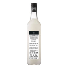 1883 MAISON ROUTIN label closeup highlighting almond flavor and French origin benefit