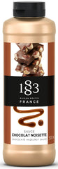 1883 Maison Routin front bottle showing chocolate hazelnut flavor and premium French quality