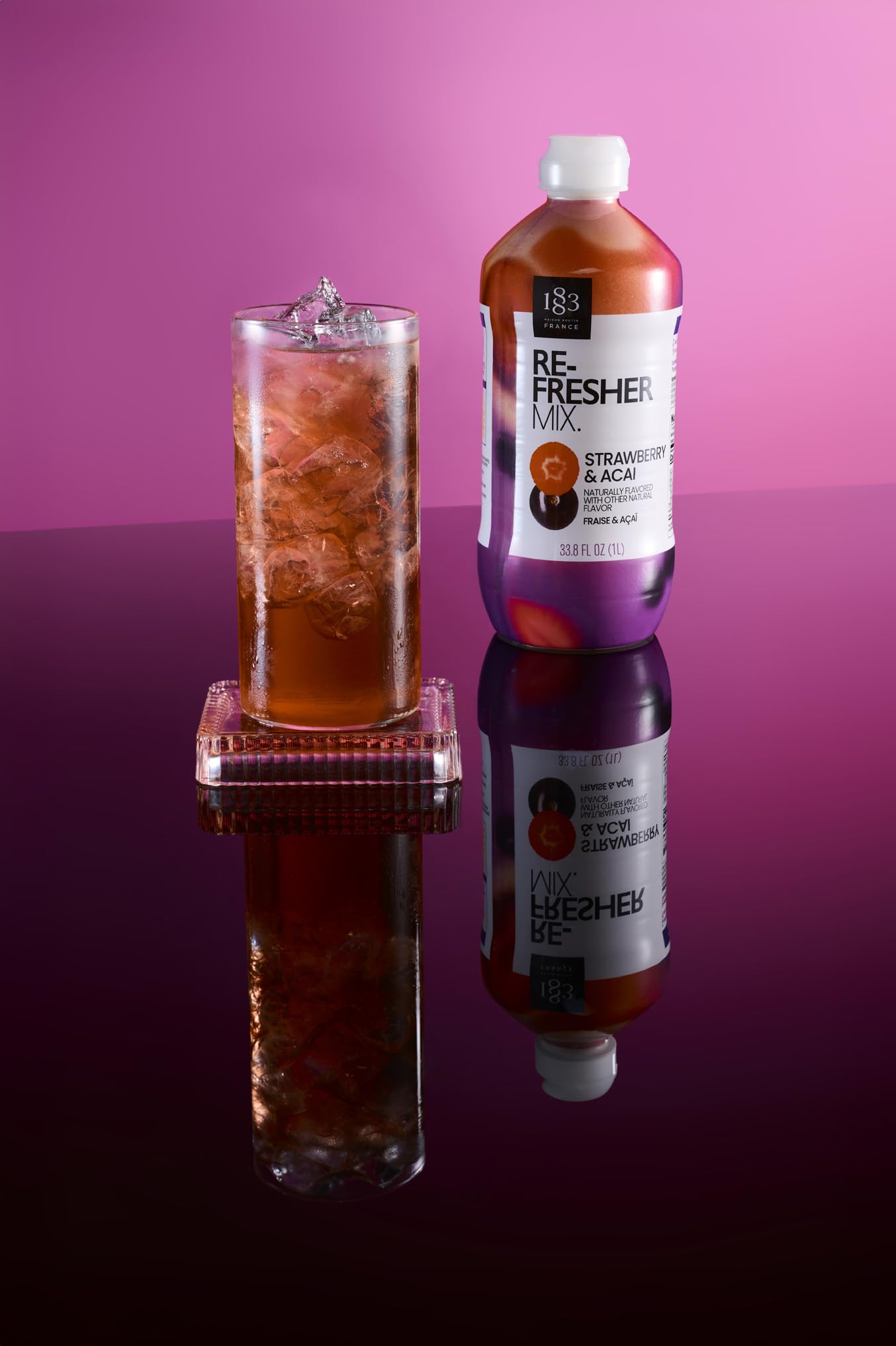 1883 MAISON ROUTIN pouring into glass demonstrating quick mixability benefit