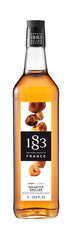 1883 roasted hazelnut bottle front label showing flavor and premium café-quality taste